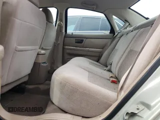 2004 Ford Taurus SES with VIN 1FAFP55S54A194897, listed as a Copart auction lot 63565945 with 131,294 mi miles and Salvage title. Bid and sale history available at DreamBid. Image 10.
