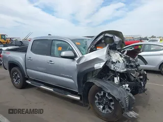 2021 Toyota Tacoma SR z VIN 3TMCZ5AN1MM376395, wystawiony jako IAAI lot #42369712 z przebiegiem Nie podano mil oraz . Historia ofert i sprzedaży dostępna na DreamBid. Obrazek 1.