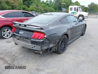 2019 Ford Mustang GT with VIN 1FA6P8CF0K5124320, listed as a IAAI auction lot 42314129 with 102,589 mi miles and . Bid and sale history available at DreamBid. Image 4.