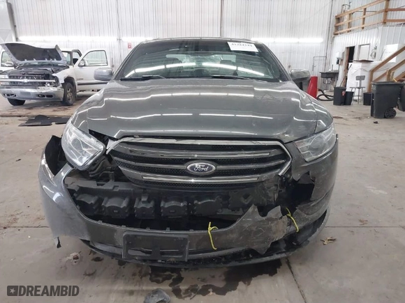 2015 Ford Taurus Limited with VIN 1FAHP2J8XFG192225, listed as a IAAI auction lot 41324244 with 100,395 mi miles. Bid and sale history available at carsss.com. Image 12.