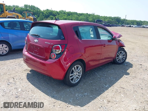 2012 Chevrolet Sonic LT with VIN 1G1JC6SH7C4135418, listed as a IAAI auction lot 42464564 with 169,035 mi miles and . Bid and sale history available at DreamBid. Image 4.