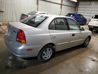2004 Hyundai Accent GL with VIN KMHCG45C04U544804, listed as a Copart auction lot 72912984 with 121,178 mi miles and Salvage Title. Bid and sale history available at carsss.com. Image 3.