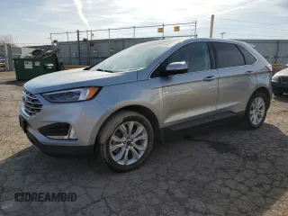 2020 Ford Edge Titanium with VIN 2FMPK4K98LBA24265, listed as a Copart auction lot 53507665 with 82,725 mi miles and Salvage title. Bid and sale history available at DreamBid. Image 1.