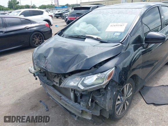2015 Honda Fit EX-L z VIN 3HGGK5H81FM723962, wystawiony jako IAAI lot #42455367 z przebiegiem 104 859 mil mil oraz . Historia ofert i sprzedaży dostępna na DreamBid. Obrazek 6.