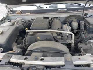 2003 Chevrolet TrailBlazer LS with VIN 1GNDS13S332326020, listed as a IAAI auction lot 42075836 with 221,748 mi miles. Bid and sale history available at carsss.com. Image 10.