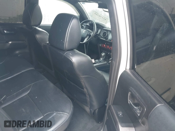 2019 Toyota Tacoma SR z VIN 3TMCZ5AN0KM232852, wystawiony jako IAAI lot #42178269 z przebiegiem 71 545 mil mil oraz . Historia ofert i sprzedaży dostępna na DreamBid. Obrazek 8.