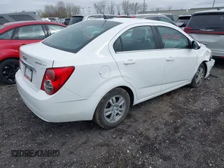 2015 Chevrolet Sonic LT with VIN 1G1JC5SH2F4105547, listed as a IAAI auction lot 42147287 with 59,073 mi miles and . Bid and sale history available at DreamBid. Image 4.