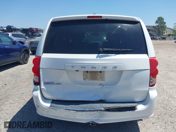 2014 Dodge Grand Caravan American Value with VIN 2C4RDGBG5ER187005, listed as a IAAI auction lot 42018333 with 216,149 mi miles and . Bid and sale history available at DreamBid. Image 16.