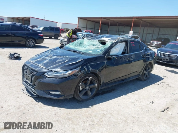 2022 Nissan Sentra SR z VIN 3N1AB8DV0NY313438, wystawiony jako IAAI lot #42076992 z przebiegiem Nie podano mil oraz . Historia ofert i sprzedaży dostępna na DreamBid. Obrazek 17.