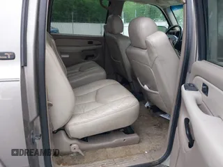 2003 Chevrolet Suburban LT z VIN 1GNEC16Z13J140136, wystawiony jako IAAI lot #42142827 z przebiegiem 252 698 mil mil oraz . Historia ofert i sprzedaży dostępna na DreamBid. Obrazek 8.