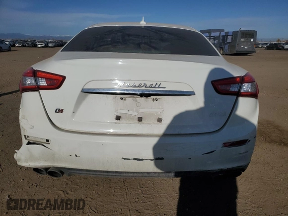2014 Maserati Ghibli S Q4 z VIN ZAM57RTAXE1092970, wystawiony jako Copart lot #48617585 z przebiegiem 92 976 mil mil oraz Szkoda całkowita • Salvage title. Historia ofert i sprzedaży dostępna na DreamBid. Obrazek 6.