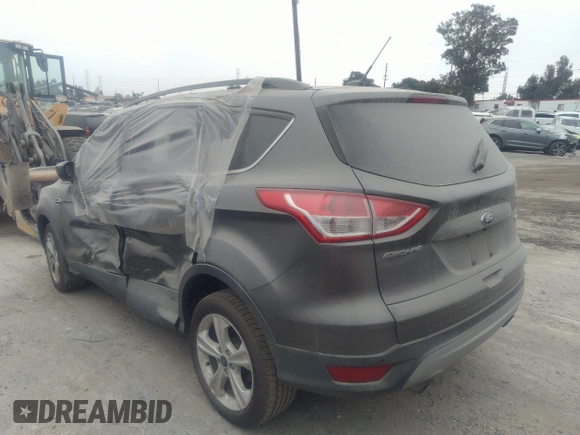 2014 Ford Escape SE with VIN 1FMCU0GXXEUA77765, listed as a IAAI auction lot 40158558 with 88,373 mi miles. Bid and sale history available at carsss.com. Image 3.