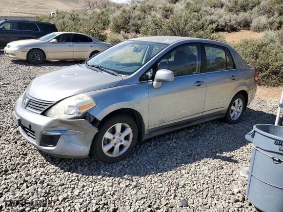 2007 Nissan Versa 1.8 S with VIN 3N1BC11E17L446450, listed as a Copart auction lot 52631415 with 121,006 mi miles and Salvage Title. Bid and sale history available at carsss.com. Image 1.