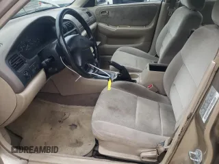 1998 Mazda 626 DX with VIN 1YVGF22C1W5762498, listed as a Copart auction lot 78283944 with 210,639 mi miles and Salvage Title. Bid and sale history available at carsss.com. Image 7.
