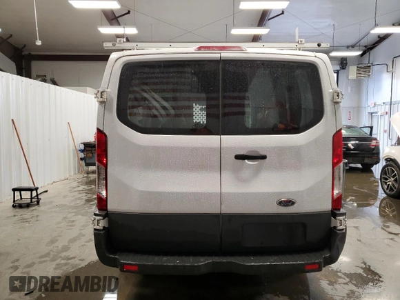2015 Ford Transit Cargo with VIN 1FTNR1ZM4FKB20551, listed as a Copart auction lot 54079765 with 168,433 mi miles and Clean Title. Bid and sale history available at DreamBid. Image 6.