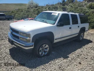 1999 Chevrolet Suburban z VIN 3GNFK16R4XG230296, wystawiony jako Copart lot #57215265 z przebiegiem 2 323 446 mil mil oraz Czysty tytuł • Clean title. Historia ofert i sprzedaży dostępna na DreamBid. Obrazek 1.