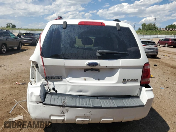 2009 Ford Escape Hybrid with VIN 1FMCU59319KA32481, listed as a Copart auction lot 60636465 with 68,541 mi miles and Salvage title. Bid and sale history available at DreamBid. Image 6.