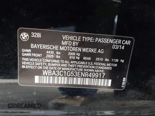 2014 BMW 3 Series 328i with VIN WBA3C1G53ENR49917, listed as a IAAI auction lot 42116704 with 148,630 mi miles and . Bid and sale history available at carsss.com. Image 9.