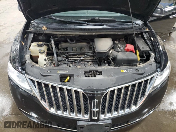 2013 Lincoln MKX z VIN 2LMDJ8JK0DBL26172, wystawiony jako Copart lot #54332155 z przebiegiem 158 182 mil mil oraz Szkoda całkowita • Salvage title. Historia ofert i sprzedaży dostępna na DreamBid. Obrazek 12.