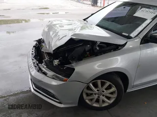 2016 Volkswagen Jetta Sedan 1.4T SE with VIN 3VWD67AJ2GM252658, listed as a IAAI auction lot 41757319 with 147,483 mi miles. Bid and sale history available at carsss.com. Image 6.