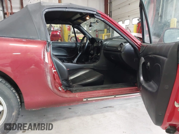 2001 Mazda MX-5 Miata with VIN JM1NB353X10215794, listed as a IAAI auction lot 42092359 with 121,684 mi miles and . Bid and sale history available at DreamBid. Image 5.