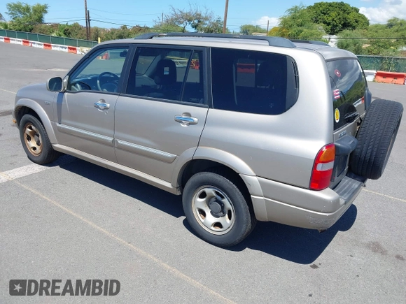 2002 Suzuki XL-7 with VIN JS3TY92V724105263, listed as a IAAI auction lot 41858262 with 103,249 mi miles. Bid and sale history available at carsss.com. Image 3.
