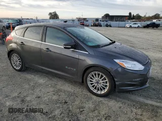 2015 Ford Focus Electric with VIN 1FADP3R43FL221870, listed as a Copart auction lot 79549284 with 67,079 mi miles and Salvage title. Bid and sale history available at DreamBid. Image 4.