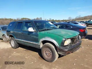 1997 Chevrolet Blazer LS z VIN 1GNDT13W3V2147849, wystawiony jako IAAI lot #41605551 z przebiegiem 208 546 mil mil oraz . Historia ofert i sprzedaży dostępna na DreamBid. Obrazek 1.