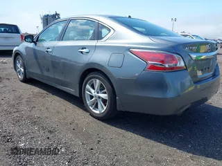2014 Nissan Altima 2.5 S with VIN 1N4AL3AP1EC420984, listed as a IAAI auction lot 42209666 with 165,085 mi miles and . Bid and sale history available at carsss.com. Image 3.