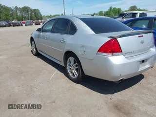 2013 Chevrolet Impala LTZ with VIN 2G1WC5E36D1205567, listed as a IAAI auction lot 42114960 with 169,804 mi miles and . Bid and sale history available at DreamBid. Image 3.