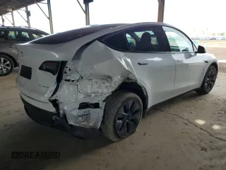 2024 Tesla Model Y Long Range with VIN 7SAYGDEE1RF165311, listed as a Copart auction lot 51711665 with 15,190 mi miles and Salvage Title. Bid and sale history available at DreamBid. Image 3.