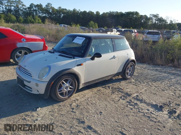 2006 MINI Hardtop with VIN WMWRC335X6TK16871, listed as a IAAI auction lot 41846929 with 145,709 mi miles and . Bid and sale history available at DreamBid. Image 2.