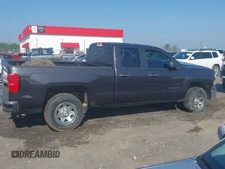 2015 Chevrolet Silverado 1500 LS with VIN 1GCRCPEC3FZ211837, listed as a IAAI auction lot 41986424 with 107,740 mi miles and . Bid and sale history available at DreamBid. Image 13.