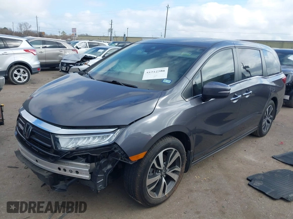 2022 Honda Odyssey Touring with VIN 5FNRL6H80NB023623, listed as a IAAI auction lot 41512586 with 63,329 mi miles and . Bid and sale history available at DreamBid. Image 18.