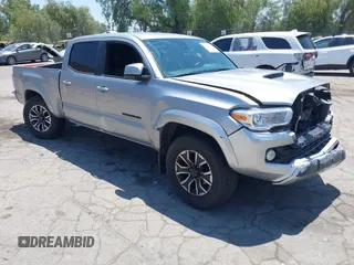 2020 Toyota Tacoma SR5 with VIN 3TMBZ5DN3LM025980, listed as a IAAI auction lot 42215140 with 67,414 mi miles and . Bid and sale history available at DreamBid. Image 1.