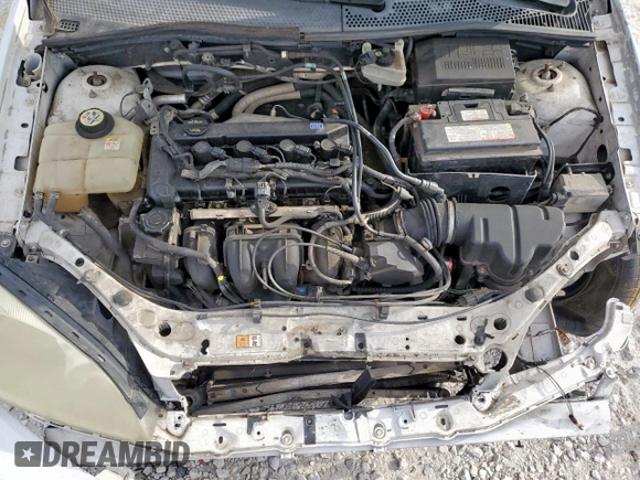 2007 Ford Focus S with VIN 1FAHP34NX7W225626, listed as a Copart auction lot 58202395 with 157,844 mi miles and Salvage title. Bid and sale history available at DreamBid. Image 11.