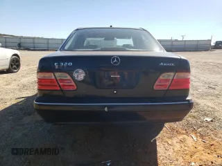 2000 Mercedes-Benz E-Class AWD with VIN WDBJF82JXYX035315, listed as a Copart auction lot 75568454 with 166,704 mi miles and Salvage Title. Bid and sale history available at carsss.com. Image 6.