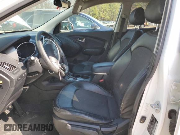 2013 Hyundai Tucson GLS with VIN KM8JU3AC1DU606047, listed as a Copart auction lot 48692885 with 185,829 mi miles and Salvage Title. Bid and sale history available at carsss.com. Image 7.