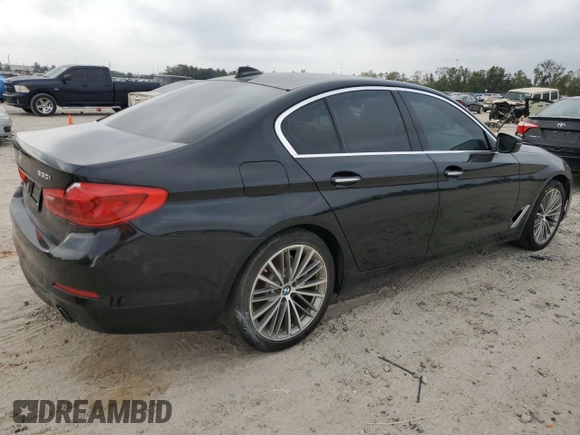 2018 BMW 5 Series 530i with VIN WBAJA5C54JG899845, listed as a Copart auction lot 83007584 with 57,379 mi miles and Salvage Title. Bid and sale history available at DreamBid. Image 3.