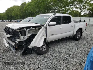 2018 Toyota Tacoma SR with VIN 3TMCZ5AN8JM121674, listed as a Copart auction lot 58715115 with 106,261 mi miles and Salvage title. Bid and sale history available at DreamBid. Image 1.