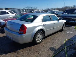 2005 Chrysler 300 with VIN 2C3JA43RX5H569173, listed as a IAAI auction lot 41618421 with 126,019 mi miles. Bid and sale history available at carsss.com. Image 4.