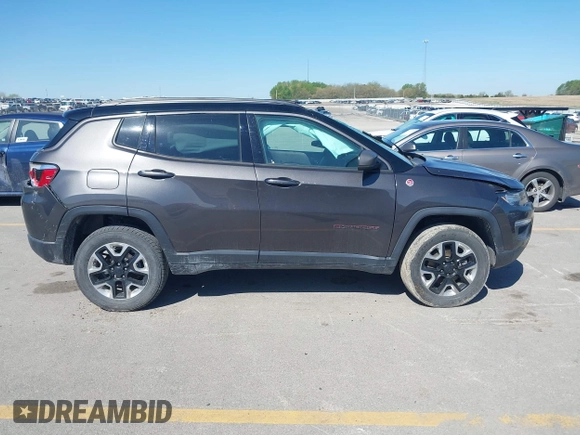 2019 Jeep Compass Trailhawk with VIN 3C4NJDDB0KT619337, listed as a IAAI auction lot 42171160 with 63,869 mi miles and . Bid and sale history available at DreamBid. Image 13.