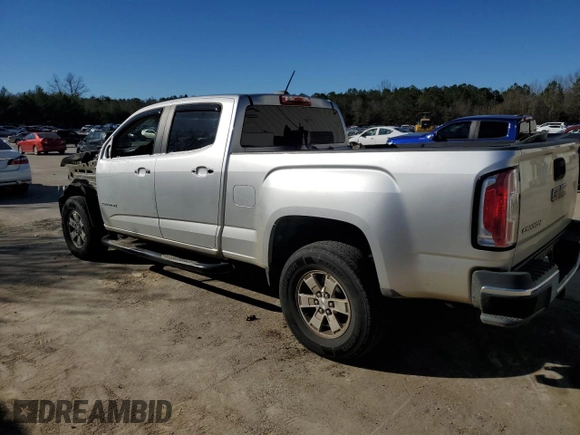 2015 GMC Canyon 2WD with VIN 1GTG5AE38F1156671, listed as a Copart auction lot 85194924 with 123,597 mi miles and Salvage Title. Bid and sale history available at DreamBid. Image 2.