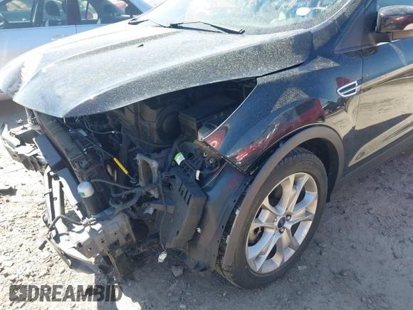 2015 Ford Escape Titanium with VIN 1FMCU0J91FUB36973, listed as a IAAI auction lot 41889560 with 93,445 mi miles and . Bid and sale history available at DreamBid. Image 17.