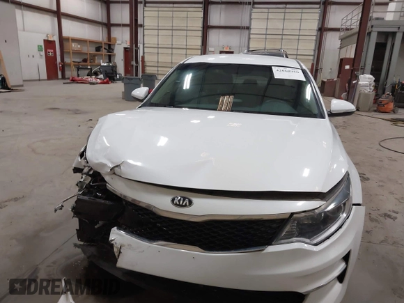 2018 Kia Optima LX with VIN 5XXGT4L38JG212678, listed as a IAAI auction lot 42068950 with 75,025 mi miles and . Bid and sale history available at carsss.com. Image 12.