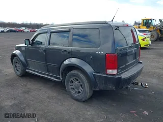 2011 Dodge Nitro SE with VIN 1D4PU2GK0BW541350, listed as a IAAI auction lot 41653467 with 207,940 mi miles. Bid and sale history available at carsss.com. Image 3.