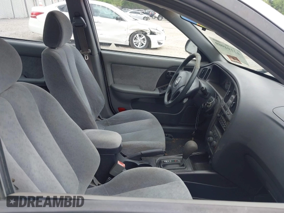 2004 Hyundai Elantra GLS z VIN KMHDN46D14U790939, wystawiony jako IAAI lot #42194909 z przebiegiem 108 180 mil mil oraz . Historia ofert i sprzedaży dostępna na DreamBid. Obrazek 5.