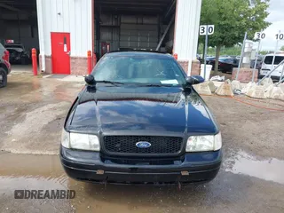 2005 Ford Police Interceptor z VIN 2FAHP71WX5X154384, wystawiony jako IAAI lot #40735796 z przebiegiem 84 143 mil mil oraz . Historia ofert i sprzedaży dostępna na DreamBid. Obrazek 12.