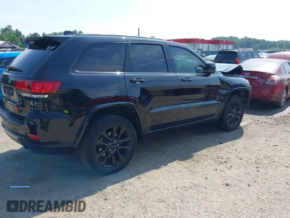 2018 Jeep Grand Cherokee Upland with VIN 1C4RJFAG2JC350975, listed as a IAAI auction lot 42612836 with 148,435 mi miles and . Bid and sale history available at DreamBid. Image 4.