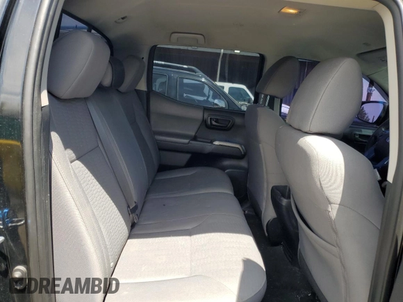 2019 Toyota Tacoma SR z VIN 3TMCZ5AN1KM253032, wystawiony jako Copart lot #52598445 z przebiegiem 69 489 mil mil oraz Szkoda całkowita • Salvage title. Historia ofert i sprzedaży dostępna na DreamBid. Obrazek 10.